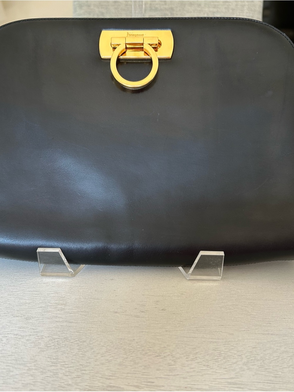 Salvatore Ferragamo Black Leather Clutch with Gold Ring Detail